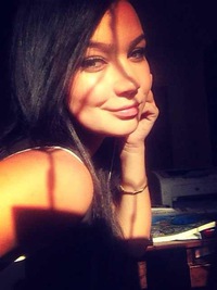 Оля Титова